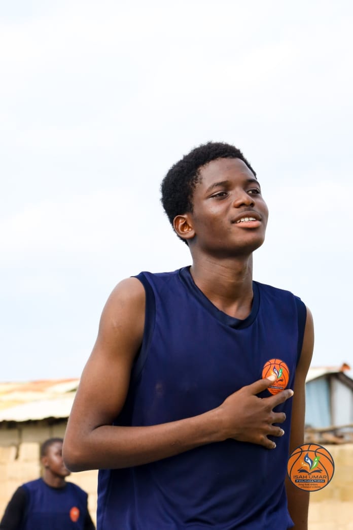 Young male player in IUF navy jersey at the 3X3 Championship