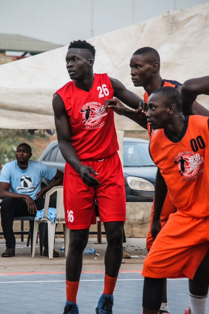 Youth basketball team together on the court